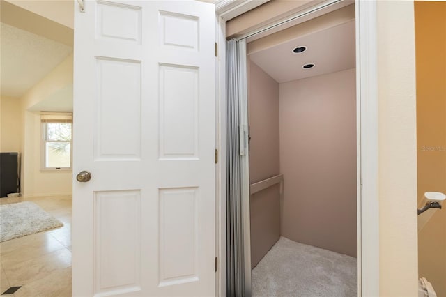 bathroom featuring tile patterned flooring