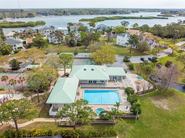 aerial view featuring a residential view and a water view