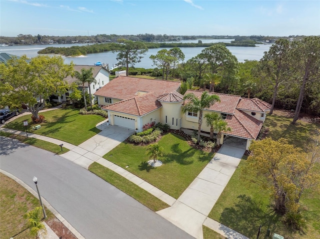 drone / aerial view with a water view