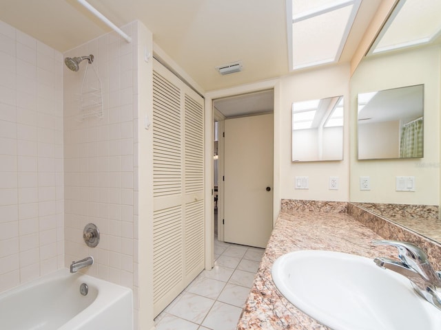 bathroom featuring a closet, vanity, and shower / tub combo with curtain