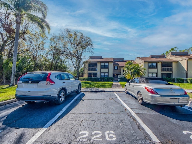 exterior space with uncovered parking