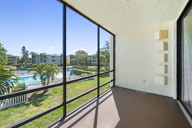 unfurnished sunroom with a healthy amount of sunlight