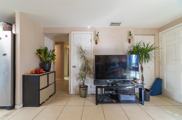 tiled living room with visible vents