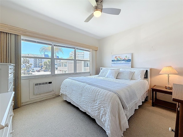 bedroom with a ceiling fan and a wall mounted AC