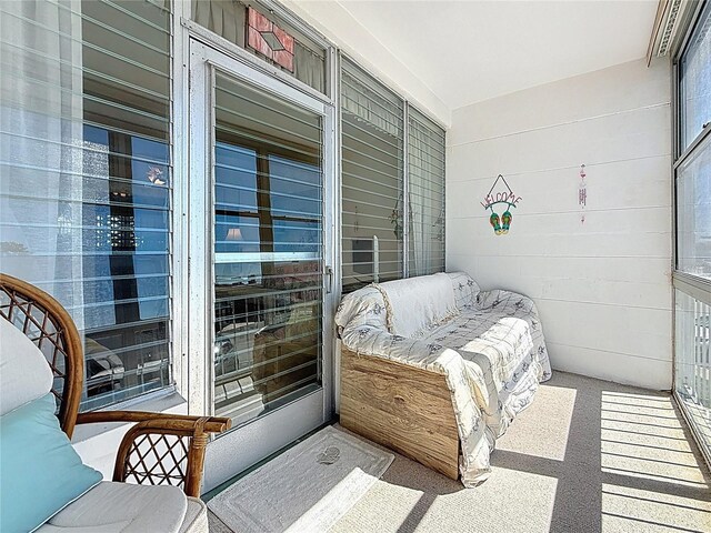 bedroom with concrete block wall