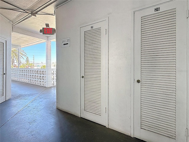 corridor with concrete floors