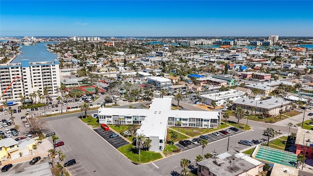 drone / aerial view with a view of city and a water view