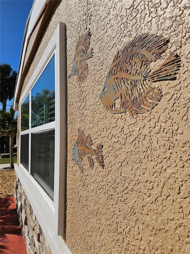 13633 Britton Dr, Hudson, FL 34667 - exterior details featuring stucco siding