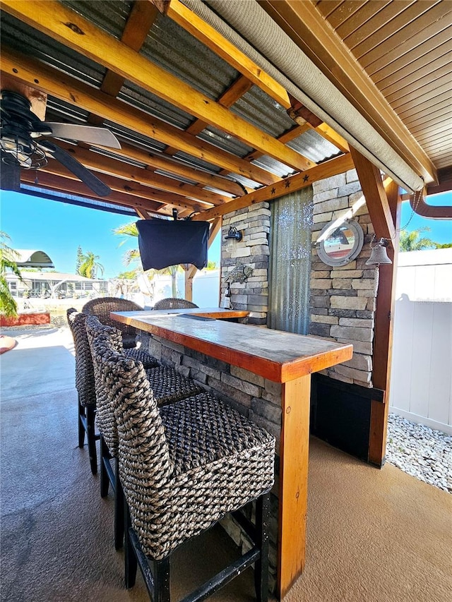13633 Britton Dr, Hudson, FL 34667 - view of patio / terrace with outdoor dry bar and ceiling fan