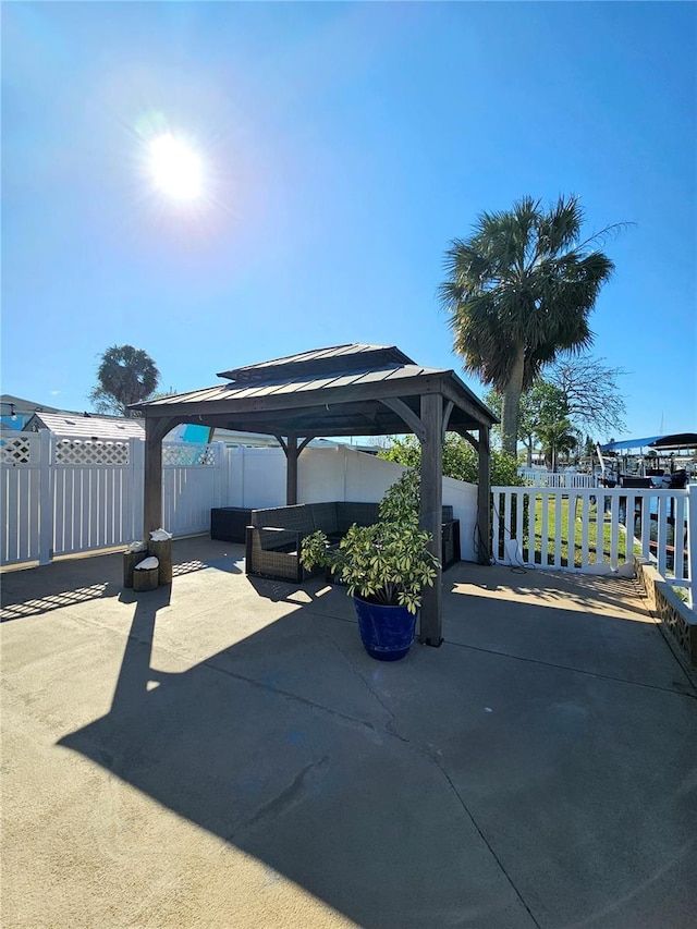 13633 Britton Dr, Hudson, FL 34667 - view of patio / terrace featuring a gazebo and fence