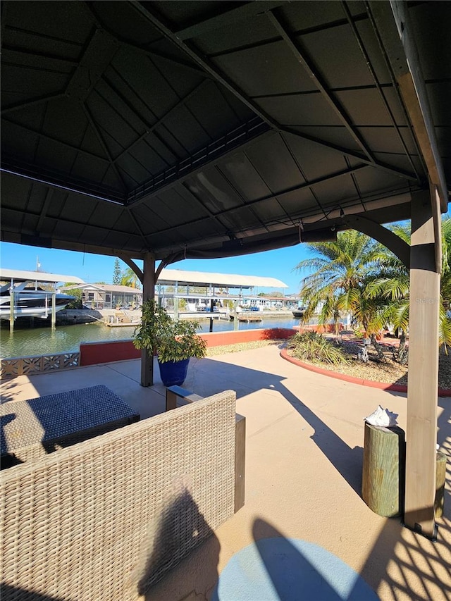 13633 Britton Dr, Hudson, FL 34667 - view of patio / terrace with a water view and a gazebo