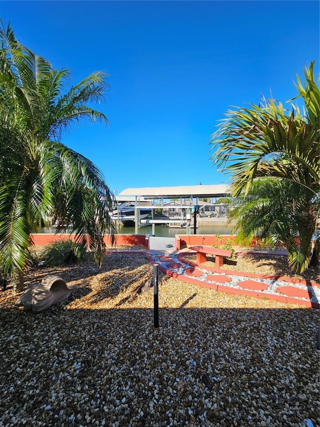 13633 Britton Dr, Hudson, FL 34667 - view of yard with a dock