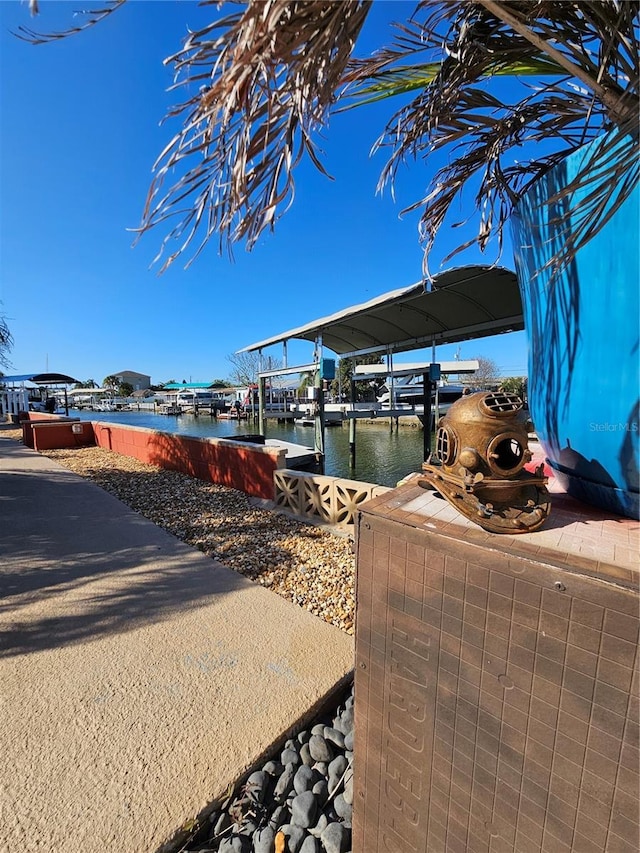 13633 Britton Dr, Hudson, FL 34667 - view of dock featuring a water view