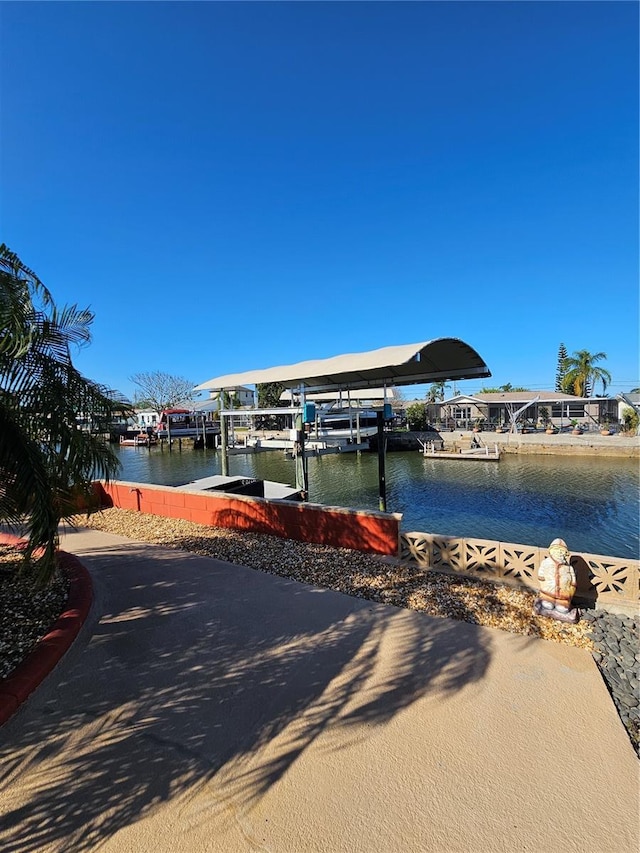 13633 Britton Dr, Hudson, FL 34667 - dock area with a water view and boat lift