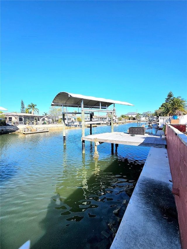 13633 Britton Dr, Hudson, FL 34667 - view of dock with a water view