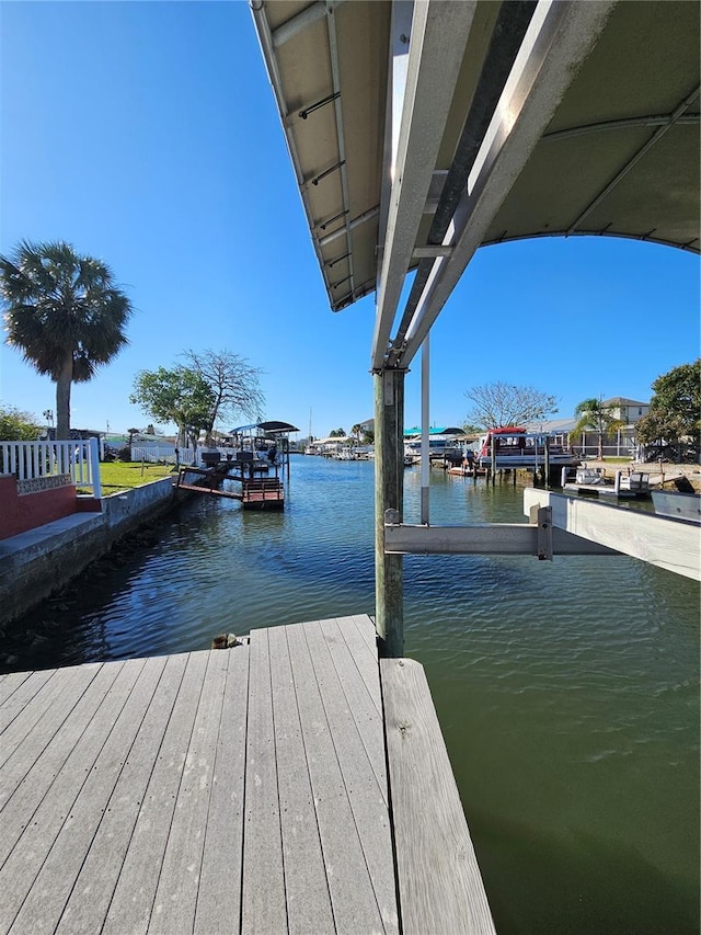 13633 Britton Dr, Hudson, FL 34667 - view of dock featuring a water view