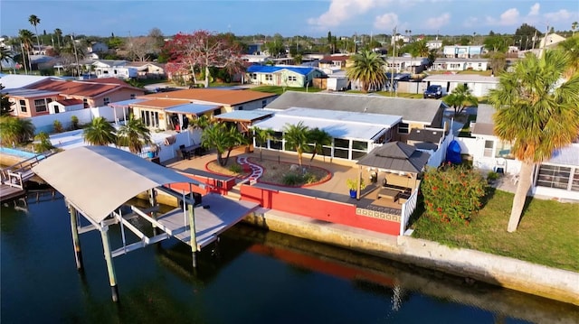 13633 Britton Dr, Hudson, FL 34667 - drone / aerial view with a residential view and a water view