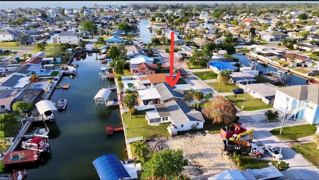 13633 Britton Dr, Hudson, FL 34667 - birds eye view of property featuring a water view and a residential view
