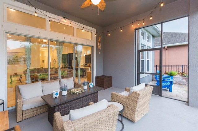 view of patio / terrace featuring a ceiling fan