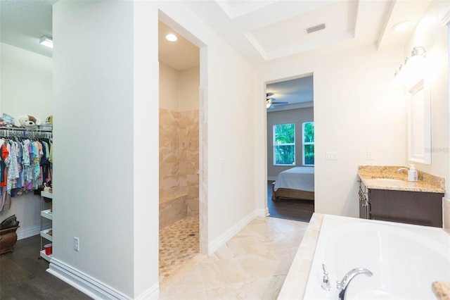 ensuite bathroom with ensuite bath, baseboards, visible vents, and walk in shower