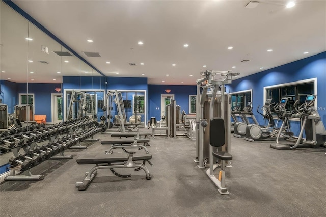 exercise room featuring recessed lighting and visible vents