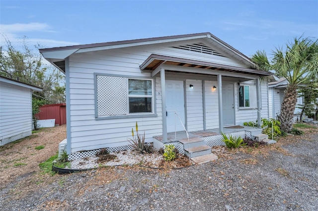 bungalow-style home with covered porch