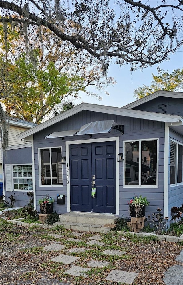 entrance to property with an attached garage