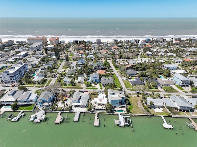 bird's eye view with a water view