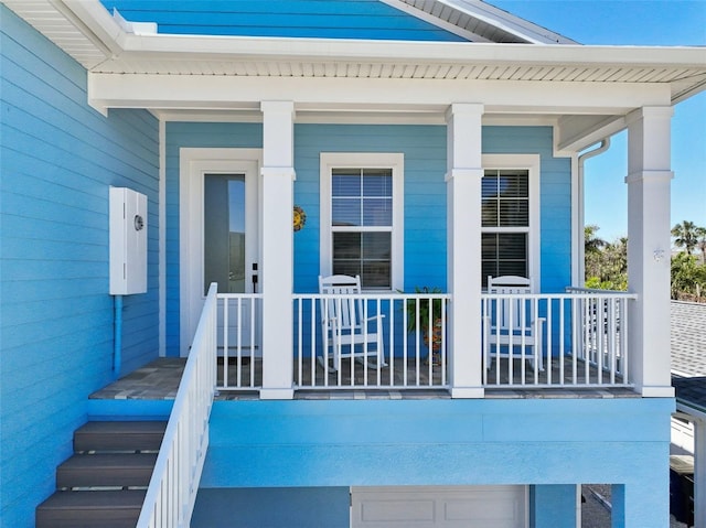 entrance to property with a porch