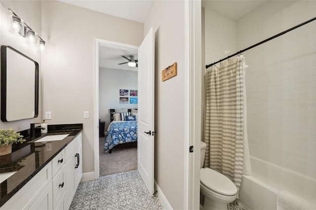 ensuite bathroom with toilet, shower / bath combo, a sink, connected bathroom, and double vanity