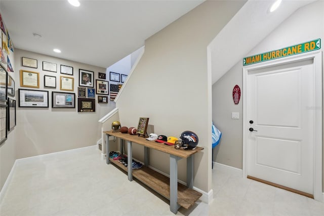 foyer featuring tile patterned flooring, stairway, recessed lighting, and baseboards