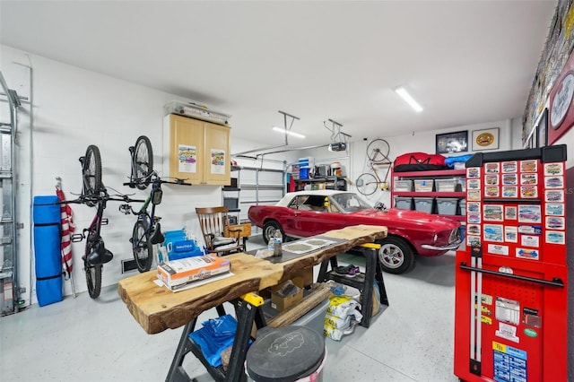 garage featuring a garage door opener