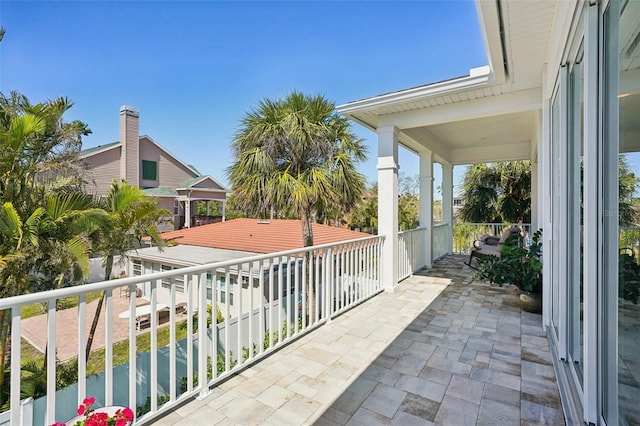 view of patio / terrace featuring a balcony