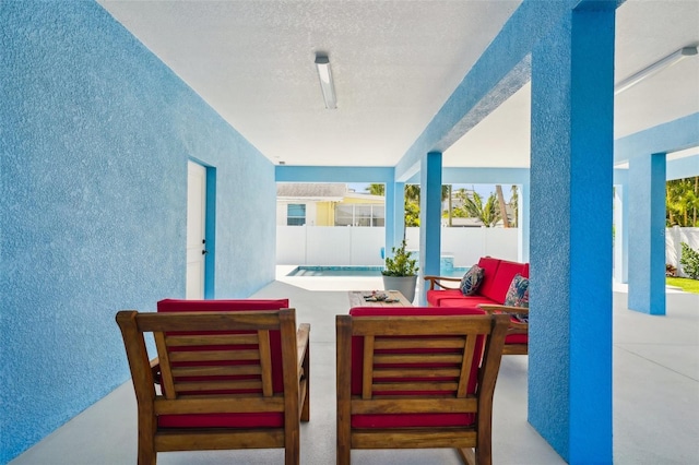 view of patio / terrace with an outdoor hangout area and a fenced backyard