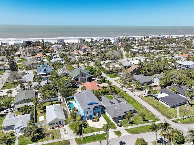 birds eye view of property with a residential view and a water view