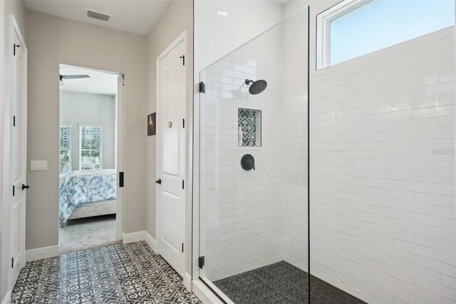 720 Bay Esplanade, Clearwater Beach, FL 33767 - ensuite bathroom with tiled shower and baseboards