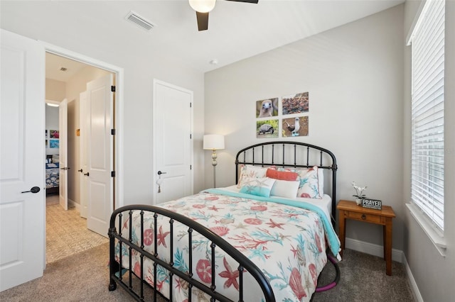 720 Bay Esplanade, Clearwater Beach, FL 33767 - carpeted bedroom with a ceiling fan and baseboards