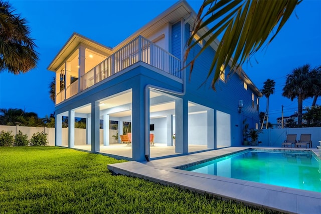 720 Bay Esplanade, Clearwater Beach, FL 33767 - rear view of property with a balcony, a patio, and stucco siding