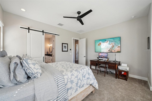 720 Bay Esplanade, Clearwater Beach, FL 33767 - bedroom with a barn door, light carpet, ceiling fan, and baseboards