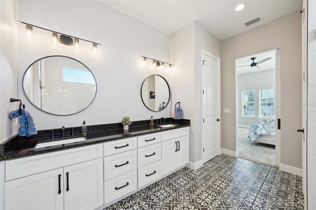 720 Bay Esplanade, Clearwater Beach, FL 33767 - bathroom featuring connected bathroom, baseboards, double vanity, a ceiling fan, and recessed lighting