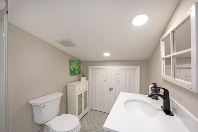 bathroom with recessed lighting, visible vents, toilet, and vanity