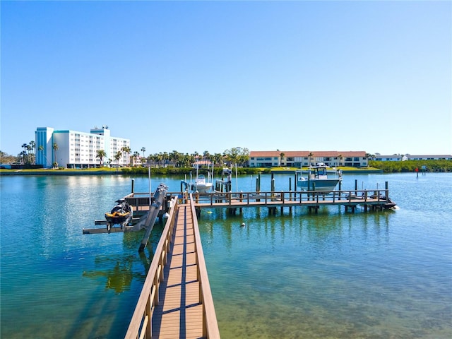 dock area featuring a water view and boat lift