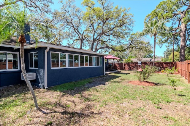 view of yard with a fenced backyard