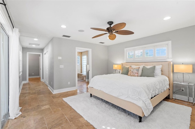 bedroom featuring recessed lighting, visible vents, baseboards, and stone tile flooring