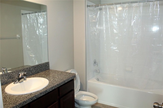 bathroom featuring shower / tub combo with curtain, vanity, and toilet