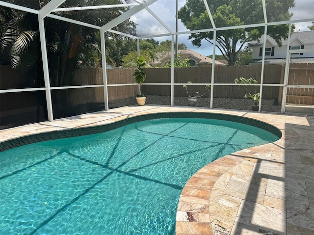9067 Cypress Trl, Seminole, FL 33777 - view of pool with a fenced backyard, a lanai, and a patio area