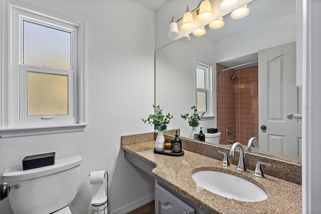 9067 Cypress Trl, Seminole, FL 33777 - bathroom featuring toilet, plenty of natural light, vanity, and a shower