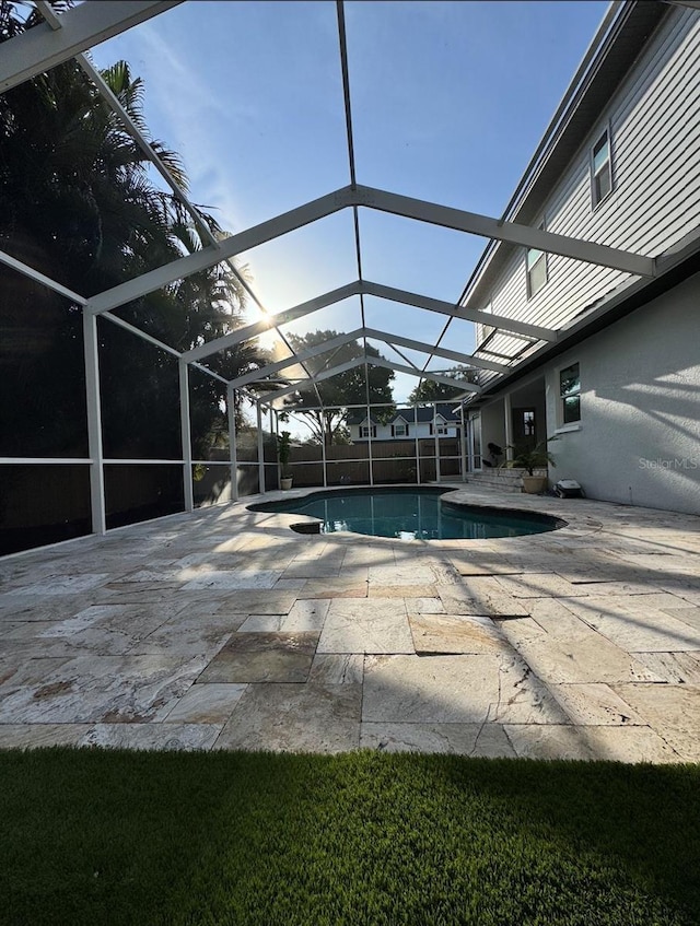 9067 Cypress Trl, Seminole, FL 33777 - outdoor pool with a patio area and a lanai