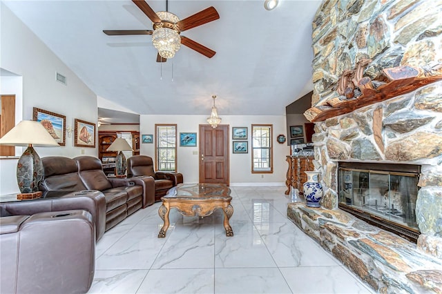 living room featuring vaulted ceiling, a fireplace, visible vents, and baseboards