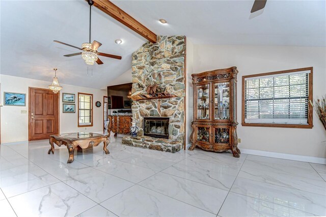 unfurnished living room with a stone fireplace, beam ceiling, a ceiling fan, and marble finish floor